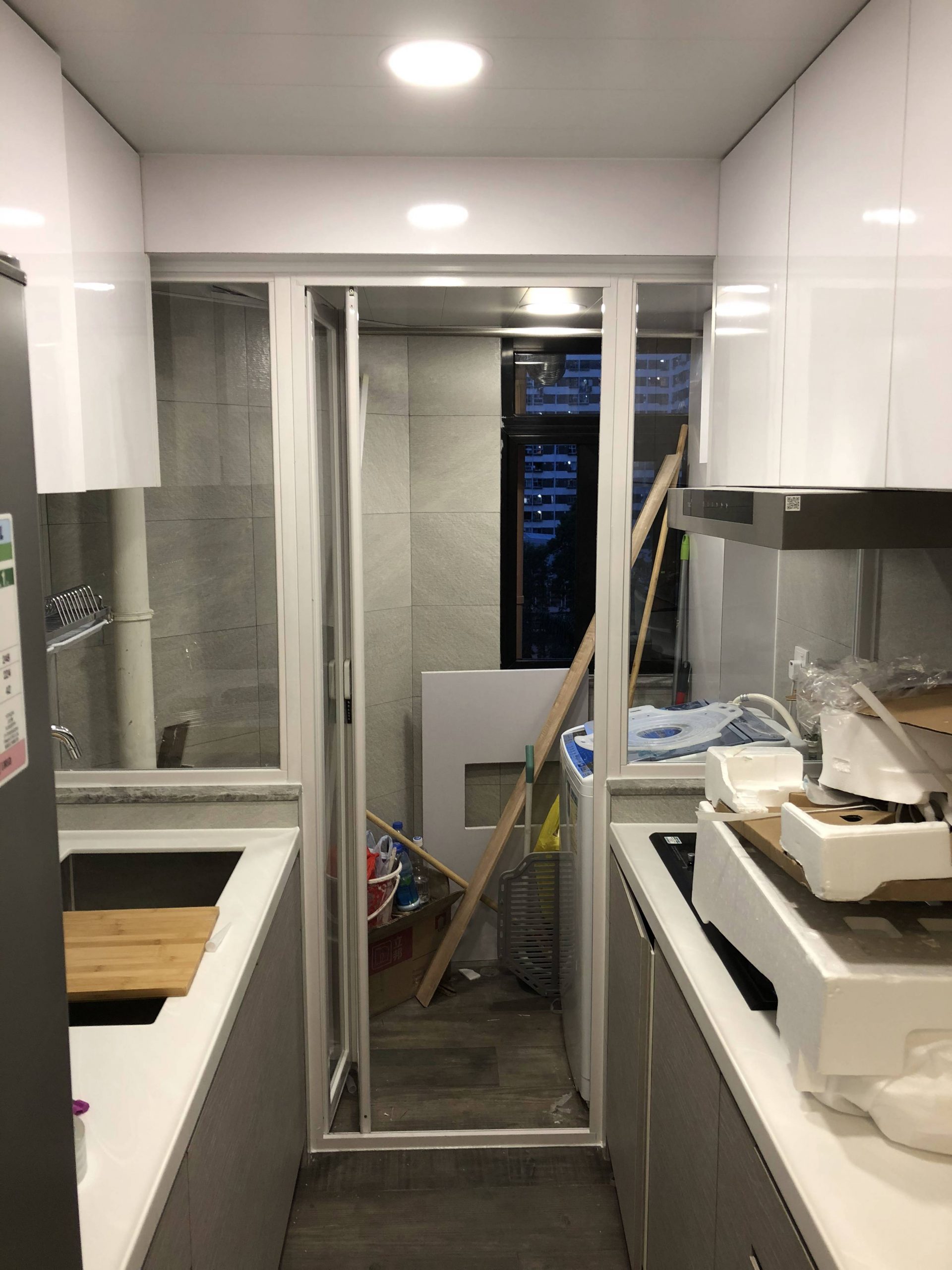 <p>Glass Partition between Cooking and Laundry Area (Opened)</p>
